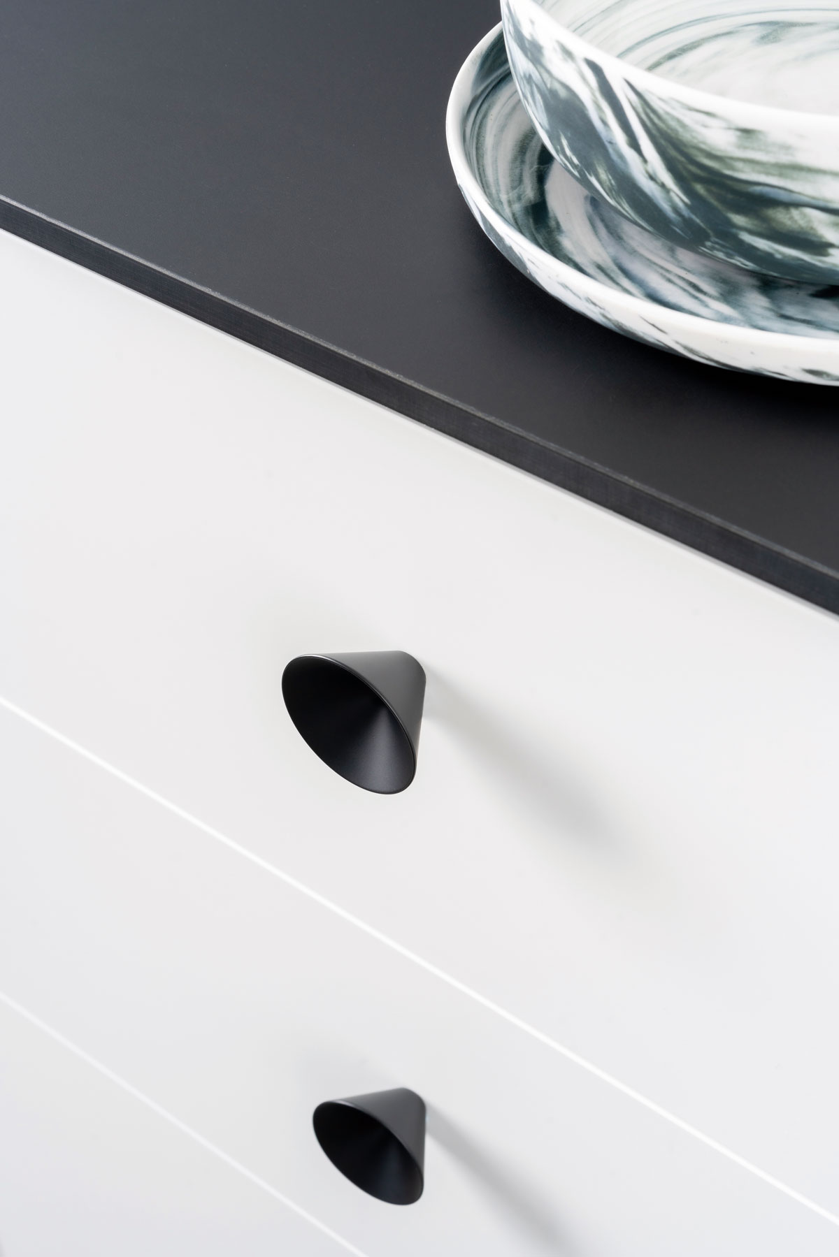 Conic black knobs