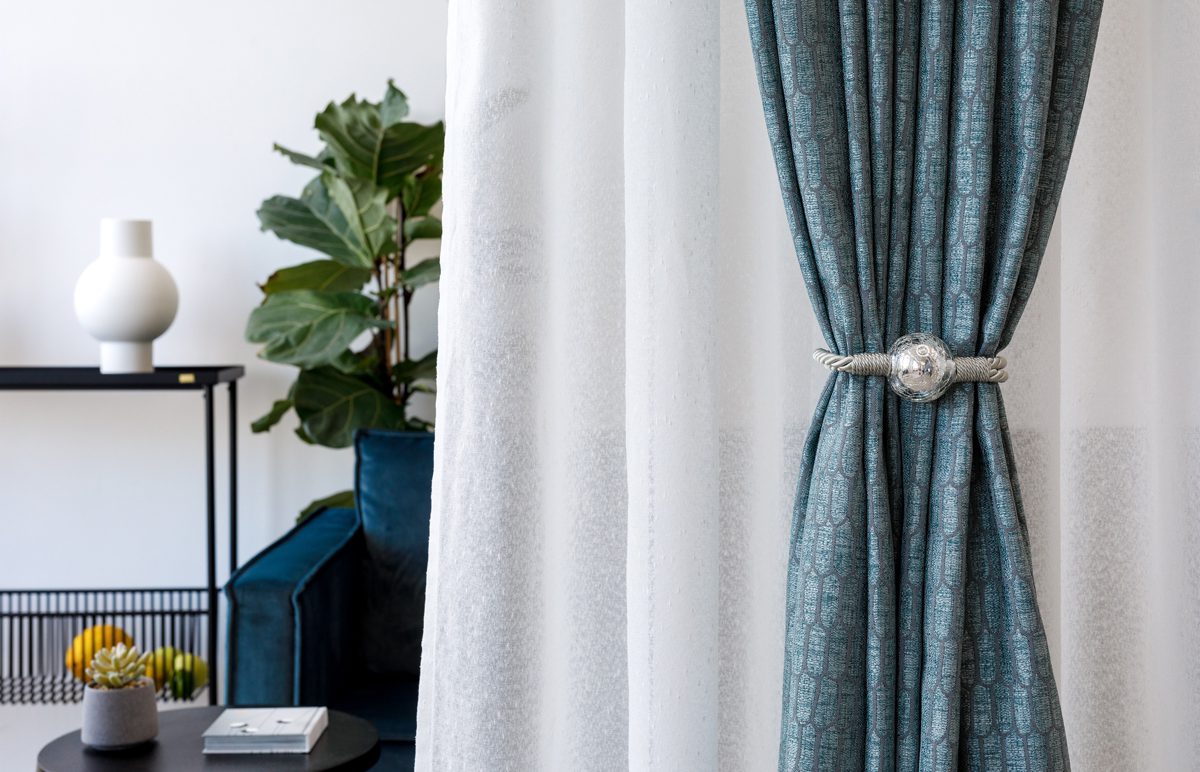 ruben blue colored material curtain