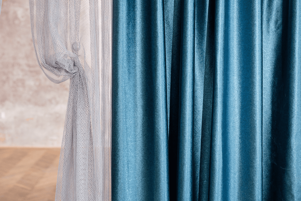 supreme blue colored material curtain